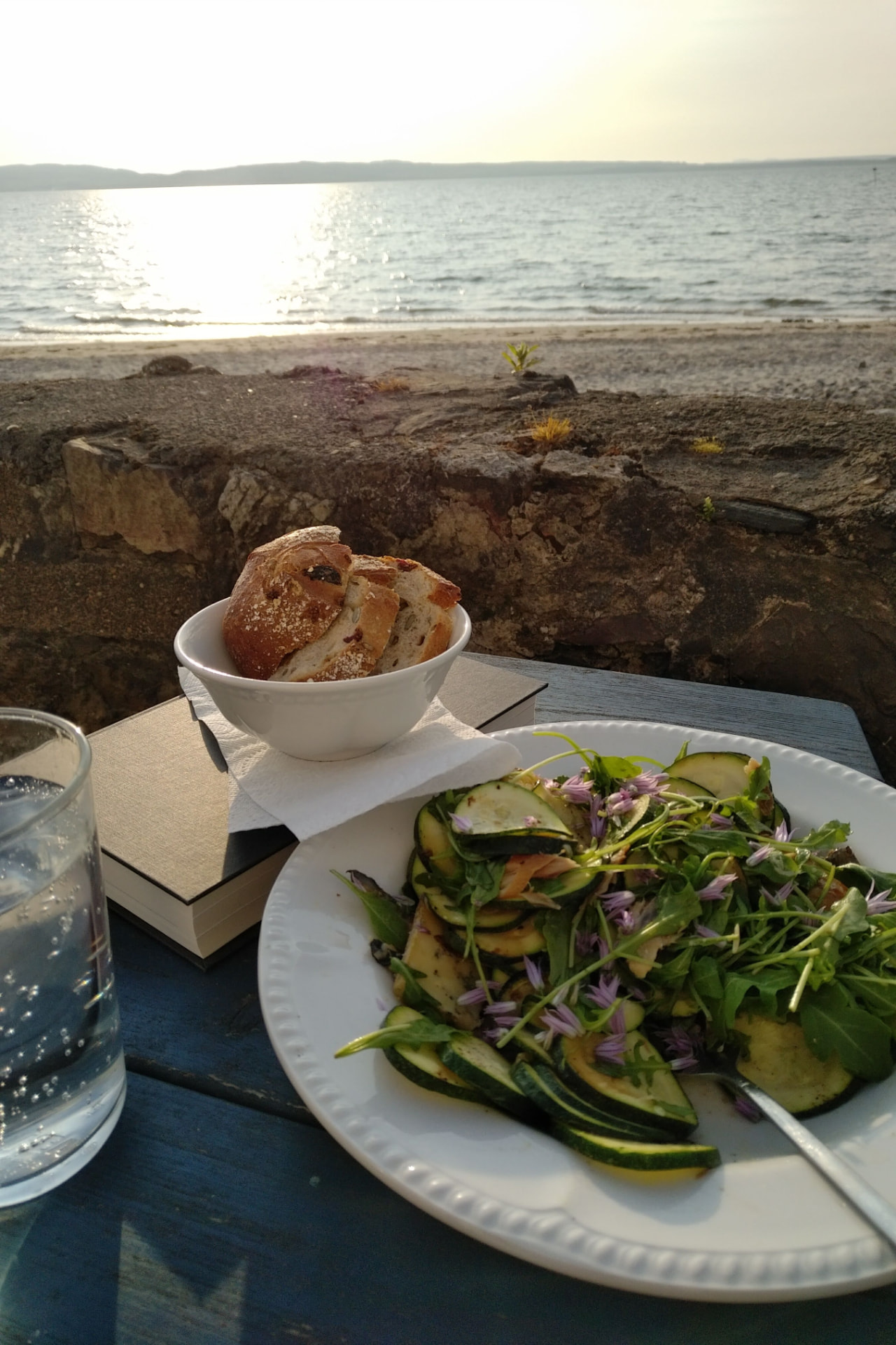 A courgette and chive-flower salad by the sea