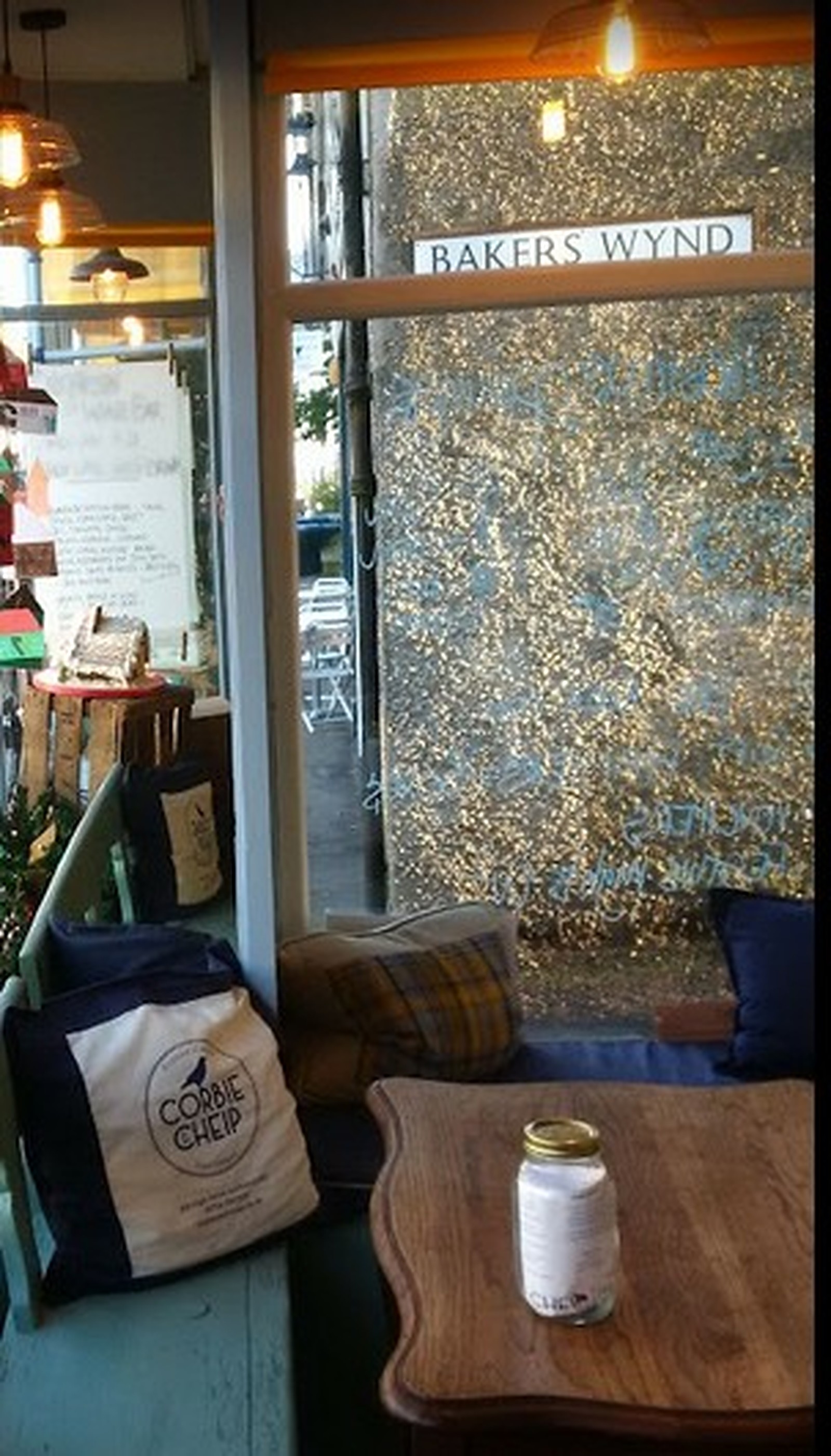 The Bakers Wynd wall, window and table at Corbie & Cheip
